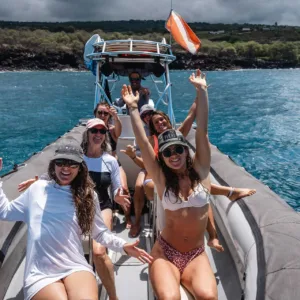 Private charter boat cruising on calm Hawaiian waters