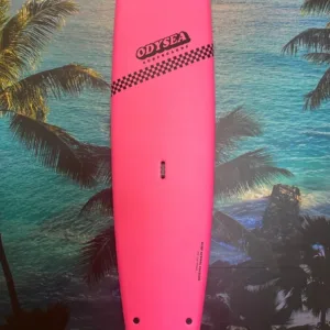 Bright pink 9-foot Odysea surfboard on sand