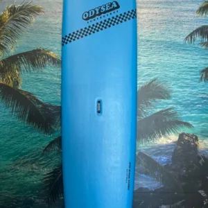 Blue 10-foot Odysea surfboard on shore