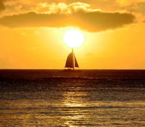 Catamaran sailing at sunset near Ko Olina Marina