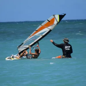 Windsurfing student practicing waterstart technique