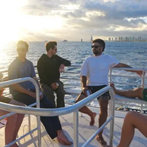Power boat cruising near Waikiki Beach at sunset