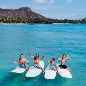 Family surfing lesson at Waikiki Beach with instructor